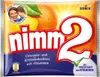 The image shows the packaging of Storck Nimm2 candies, featuring oranges and lemons, along with a father and son. Podgląd zdjęcia produktu