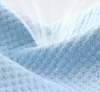 A close-up, abstract view of a blue, hexagonal-patterned fabric with light rays emanating from behind it, suggesting breathability or coolness. Náhľad obrázku produktu