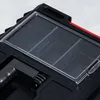 A close-up view of a black tool case with a clear, divided lid. Náhled obrázku produktu