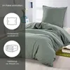 A bed with green bedding is shown, with text overlays describing the package contents. Náhľad obrázku produktu