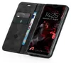 A black flip-case wallet for a smartphone, with cards and a banknote inserted. Produktbild-Vorschau