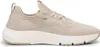 A side view of a beige sneaker on a white background. Produktbild-Vorschau