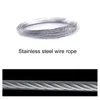 A coil of stainless steel wire rope and a close-up view of the rope. Podgląd zdjęcia produktu