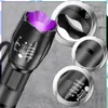 A black tactical flashlight with a purple UV light emitting from the head, shown against a textured gray background. Several circular close-up views of the flashlight's components are displayed on the right side of the image. Produktbild-Vorschau