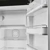 Interior view of an open white refrigerator. Produktbild-Vorschau