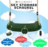 A green swing seat suspended by ropes against a background of clouds and a blue sky, with various callouts highlighting product features. Produktbild-Vorschau