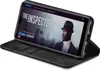 A smartphone in a black flip case is displayed at an angle, showing a movie streaming interface on its screen. Produktbild-Vorschau