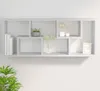 A white wall-mounted shelf unit displaying decorative items. Anteprima dell’immagine prodotto