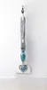 A steam mop is shown standing upright against a white wall. Voir les images du produit