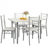 A dining set with a table and four chairs, with a vase of flowers and fruit on the table. Anteprima dell’immagine prodotto