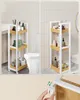 A bathroom storage cart shown in two different views, next to a toilet, and a close-up of a wheel attachment. Náhled obrázku produktu