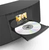 A close-up shot of a black digital radio with a CD tray extended and a CD inside. Produktbild-Vorschau
