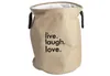 A laundry basket with text on it. Podgląd zdjęcia produktu