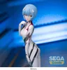 A figurine of Rei Ayanami from Evangelion in her plugsuit, posed against a blue and white striped background. Náhľad obrázku produktu