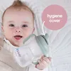 A baby is holding a sippy cup. Produktbild-Vorschau