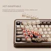 A close-up marketing image of a mechanical keyboard with some keycaps removed, showcasing its hot-swappable feature. Anteprima dell’immagine prodotto