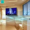 A modern living space with a TV displaying a concert. Produktbild-Vorschau