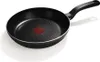A black frying pan with a red heat indicator in the center and a silver rim, placed on a white background. Produktbild-Vorschau