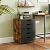 A rolling 5-drawer storage cabinet is placed on a wooden floor next to a desk in a home office setting. Anteprima dell’immagine prodotto