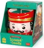 A nutcracker-shaped scented candle in its retail packaging. Produktbild-Vorschau