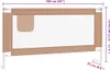 A taupe toddler bed rail with white metal frame and a storage pocket on the left side, shown against a white background with dimensions indicated by text overlays. Náhled obrázku produktu