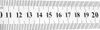 A close-up view of a metal ruler with markings and numbers. Podgląd zdjęcia produktu