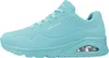 A side view of a turquoise Skechers sneaker. Voir les images du produit