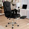 A black office chair with an extended footrest is shown in a home office setting. Produktbild-Vorschau