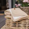 Babyono Kinderdecke 75x100 cm Baumwolle Sherpa Beige Modell Produktbild-Vorschau 6