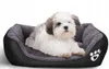 A small dog is lying in a pet bed. Anteprima dell’immagine prodotto