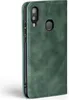 A green flip cover for a smartphone is shown against a white background. Produktbild-Vorschau