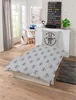 A bedroom scene with a bed, desk, and wall decor. Produktbild-Vorschau