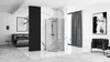 A modern bedroom with an integrated shower cabin, a bed, and seating area. Náhľad obrázku produktu