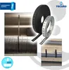 A collage of images showing perforated metal and plastic banding used for mounting and securing pipes and ducts, with product rolls and application examples. Produktbild-Vorschau