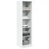 A tall, narrow white shelving unit with several shelves, some of which contain folded clothes and a box. Voir les images du produit