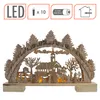 A wooden Christmas arch with a winter village scene illuminated by warm white LEDs. Náhľad obrázku produktu