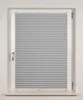 A close-up, front-facing view of a silver pleated blind installed in a white window frame. Produktbild-Vorschau
