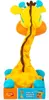 A plush giraffe toy is presented in its packaging. Náhled obrázku produktu