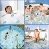 Collage of four images showing filter balls being used in different water settings: a bathtub, a hot tub, an outdoor pool, and a jacuzzi. Produktbild-Vorschau