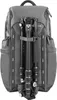 A backpack with a tripod attached to the back. Anteprima dell’immagine prodotto