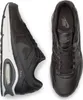A pair of black Nike Air Max Command sneakers are shown from a top-down and side view against a white background. Voir les images du produit