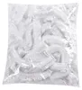A pile of clear plastic disposable shower caps in a bag. Produktbild-Vorschau