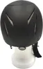 A black helmet is displayed on a white stand against a white background. Náhled obrázku produktu