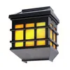 A black outdoor wall light with a flame effect. Podgląd zdjęcia produktu