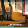 A close-up shot of a black Logitech headset with a microphone boom, placed on an orange surface with a computer monitor in the background. Produktbild-Vorschau