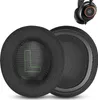 Two black ear pads for headphones, one with a green 'L' symbol, and a partial view of a black SteelSeries headset in the upper right corner. Náhled obrázku produktu