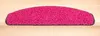 A close-up of a single pink shaggy stair mat on a wooden staircase. Produktbild-Vorschau