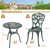 A diagram showing the dimensions of a green garden furniture set, consisting of a table and two chairs, with a house and garden in the background. Náhľad obrázku produktu