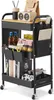 A black metal rolling cart with a wooden top, filled with various items like books, jars, a speaker, and a game controller. Produktbild-Vorschau