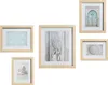 A collection of five framed pictures arranged on a white background. Produktbild-Vorschau
